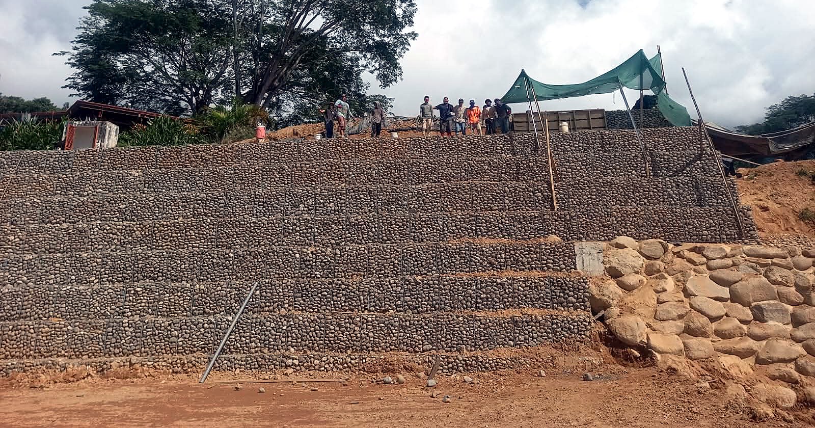 Finished gabion wall with the crew