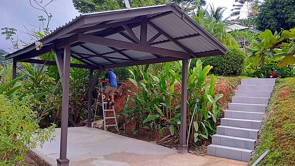 Steel-frame pergola with tiled steps
