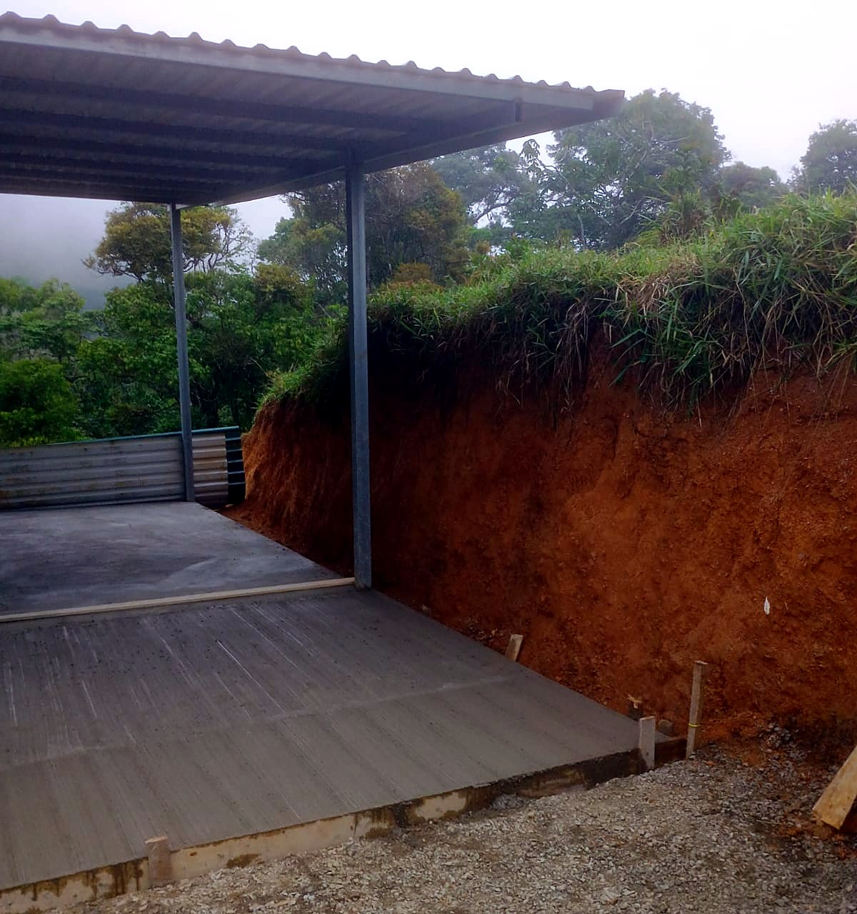 Concrete slab & steel carport